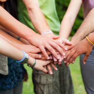 People holding hands picture for asperger's support group